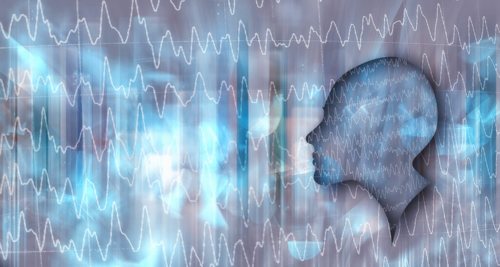 Silhouette of a face surrounded by EEG waves in blue and gray representing positive neurofeedback. It is possible to overcome mental health issues like ADHD without medication. Different types of neurofeedback in NYC are available to help you reach this goal in a safe annd effective way! Learn more here.