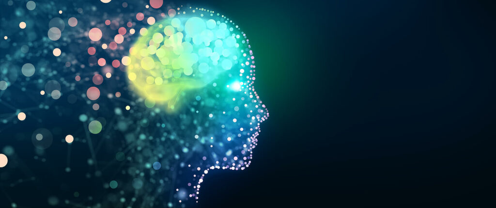 Silhouette of a face and brain with colorful particles flowing out hte back. Neurofeedback therapy in NYC is available to help you retrain your brain to find mental clarity and focus. Learn more here. 