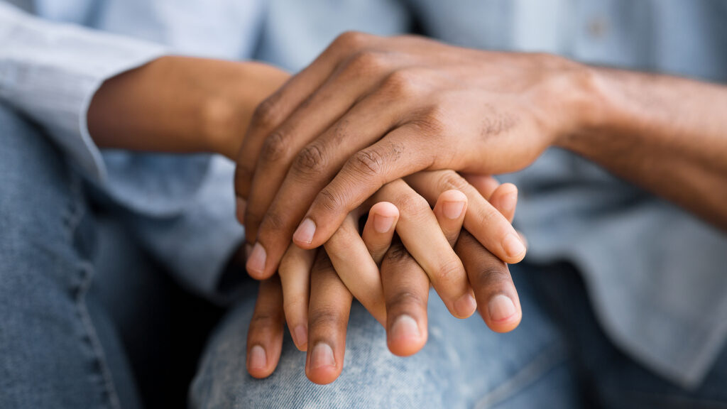 A close up of hands representing the bonds cultivated through couples therapy in NYC. Learn how to address AHDD in relationships by contacting an ADHD therapist in New York, NY today.
